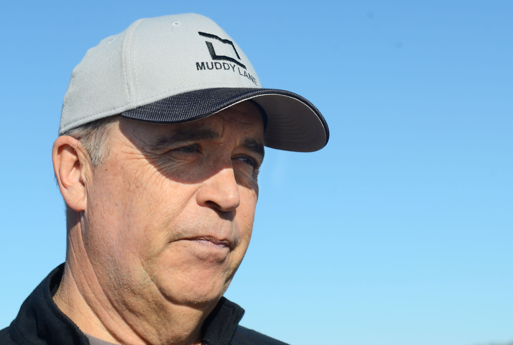 Doug Doughty looks out onto his farm